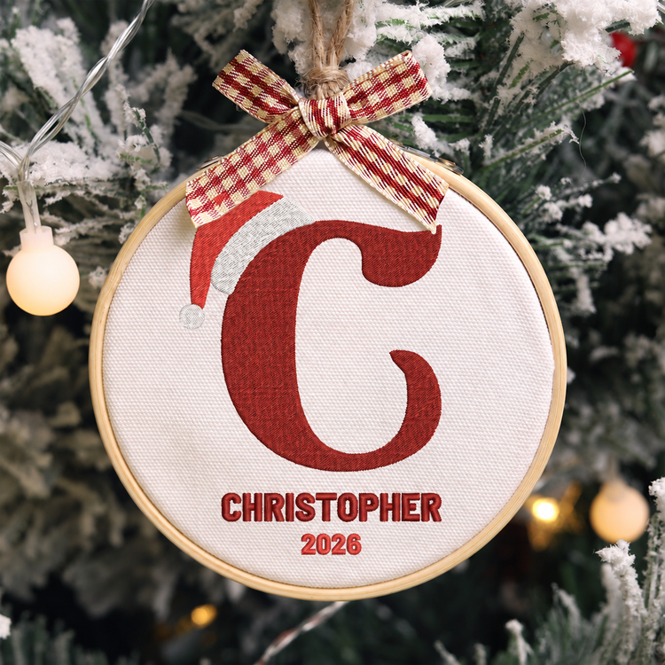 Personalized Embroidered Baby's First Christmas Ornament 2026 - Classic Santa Hat Initial - Image 1